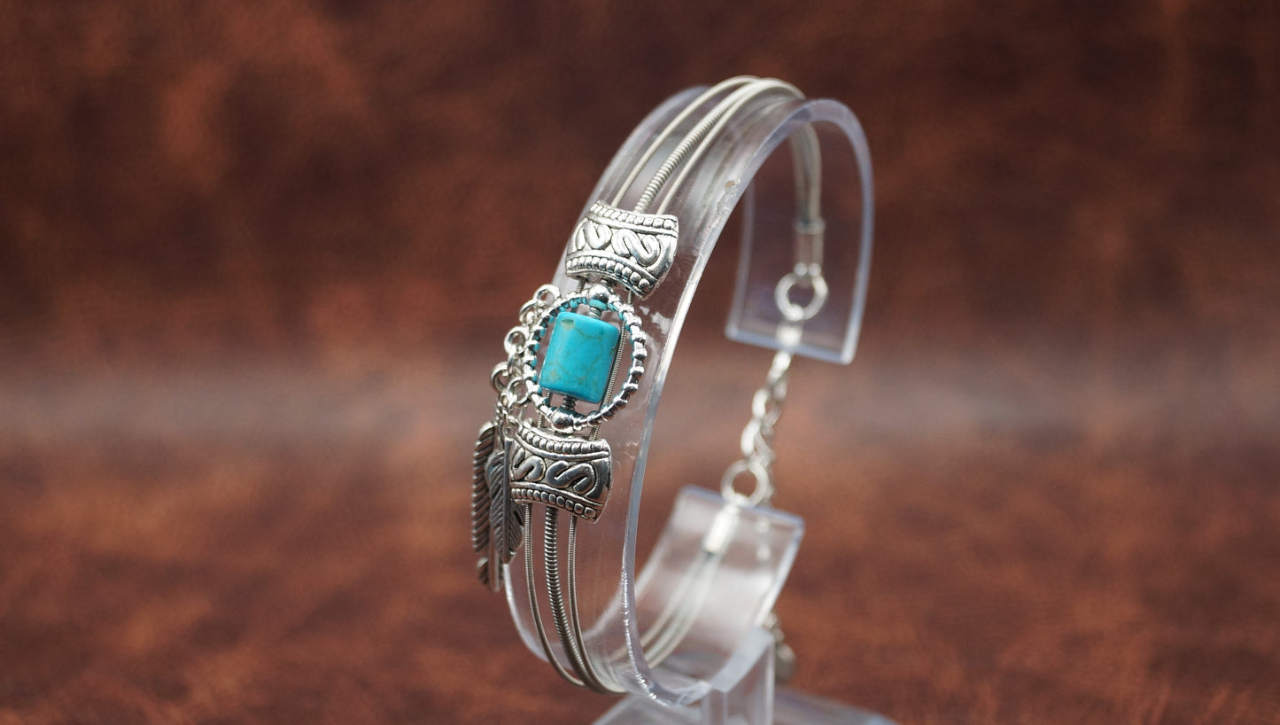 Turquoise and Silver Bracelet with Feather Charm