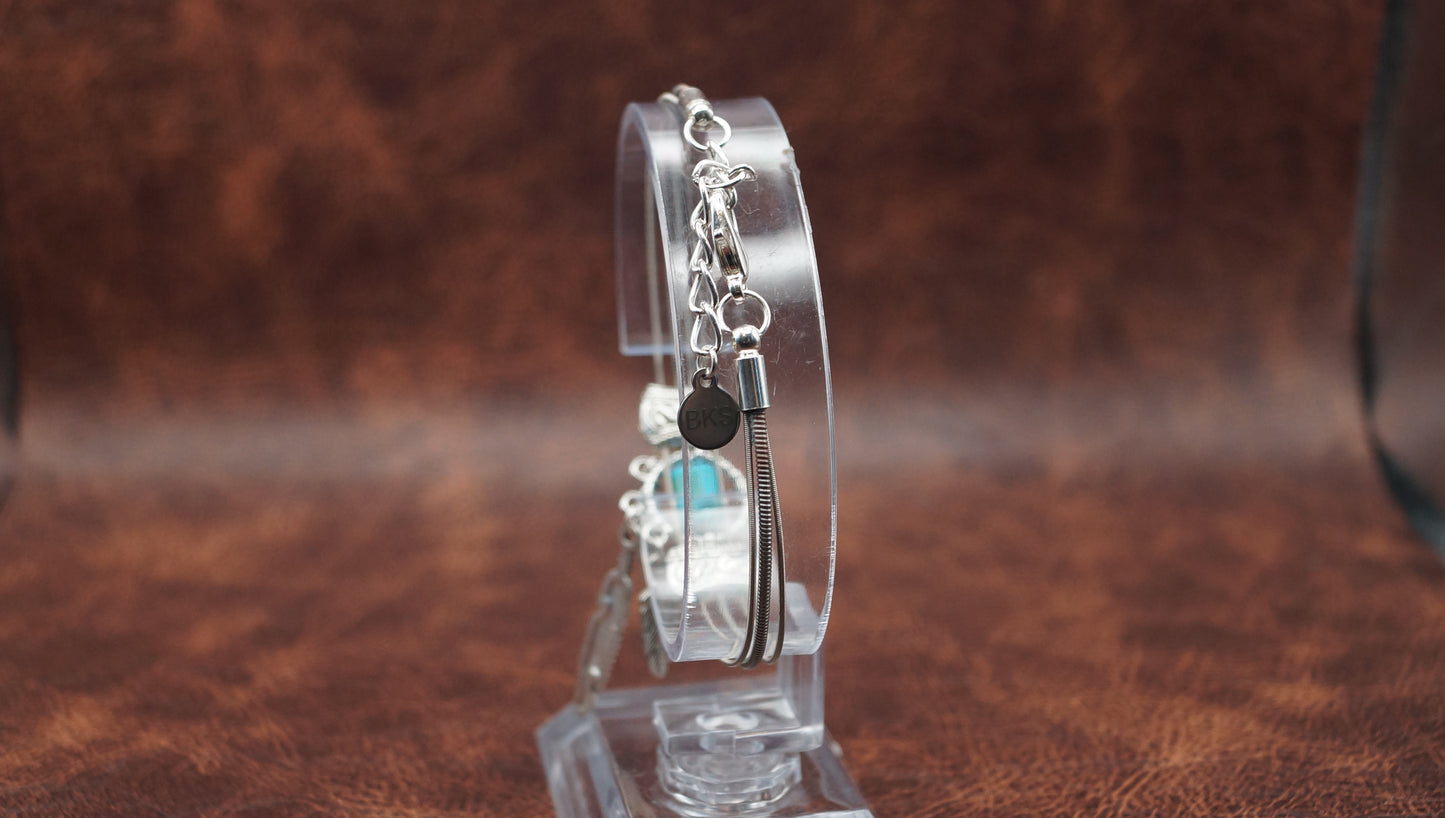 Turquoise and Silver Bracelet with Feather Charm