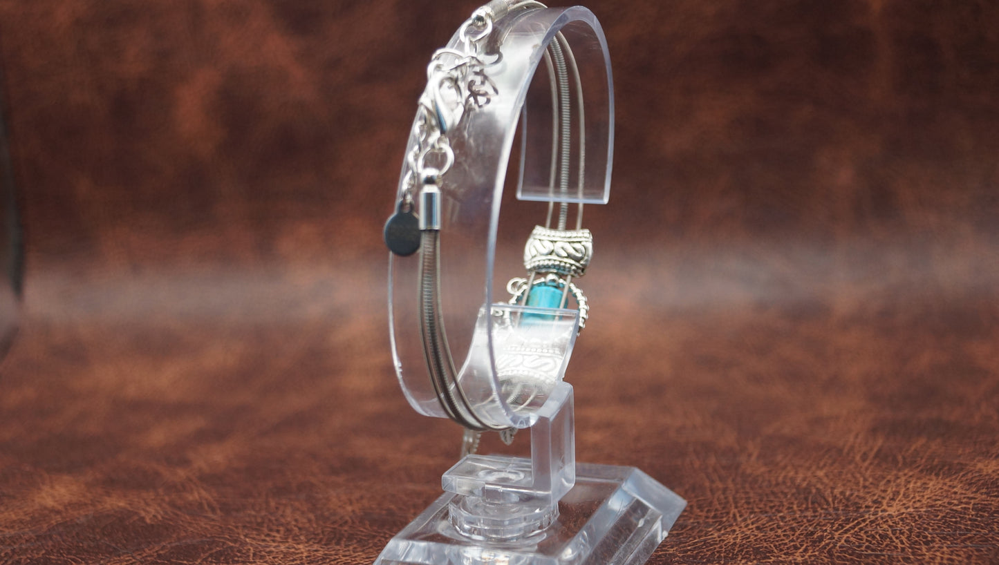 Turquoise and Silver Bracelet with Feather Charm