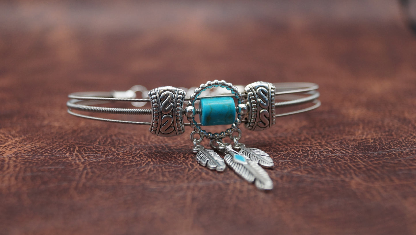 Turquoise and Silver Bracelet with Feather Charm