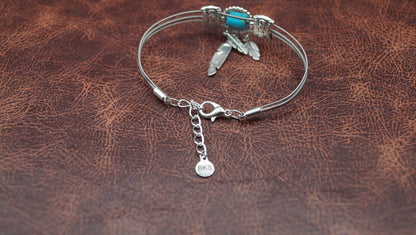 Turquoise and Silver Bracelet with Feather Charm