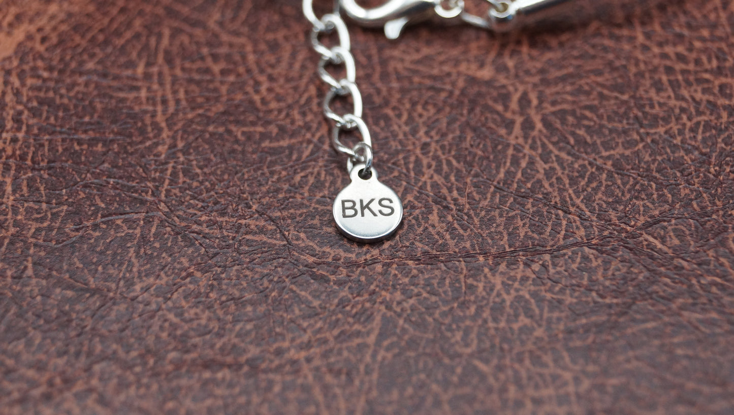 Turquoise and Silver Bracelet with Feather Charm