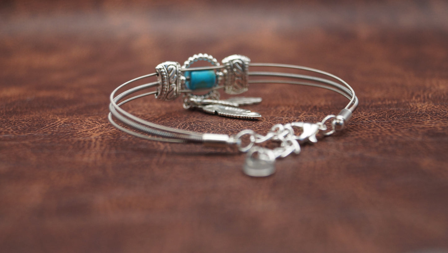 Turquoise and Silver Bracelet with Feather Charm